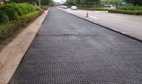 Bitumen Coating Road Paving Material Fiberglass Geogrid with Mesh Size 12.7*12.7mm